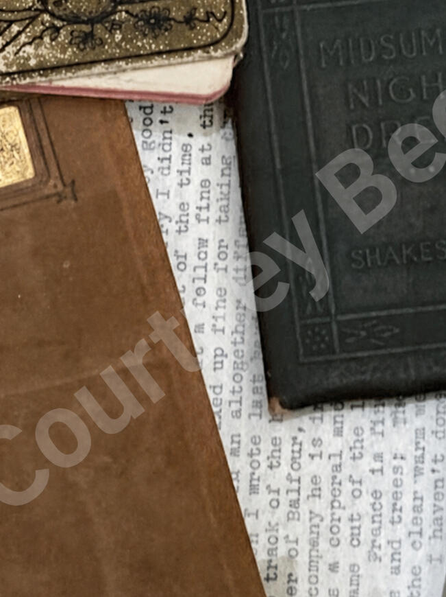 Vintage books, papers, and a box of Crayola crayons