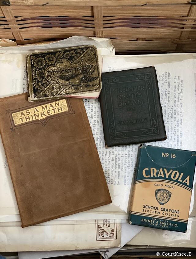© CourtKnee.B Vintage books, papers, and a box of Crayola crayons — © CourtKnee.B